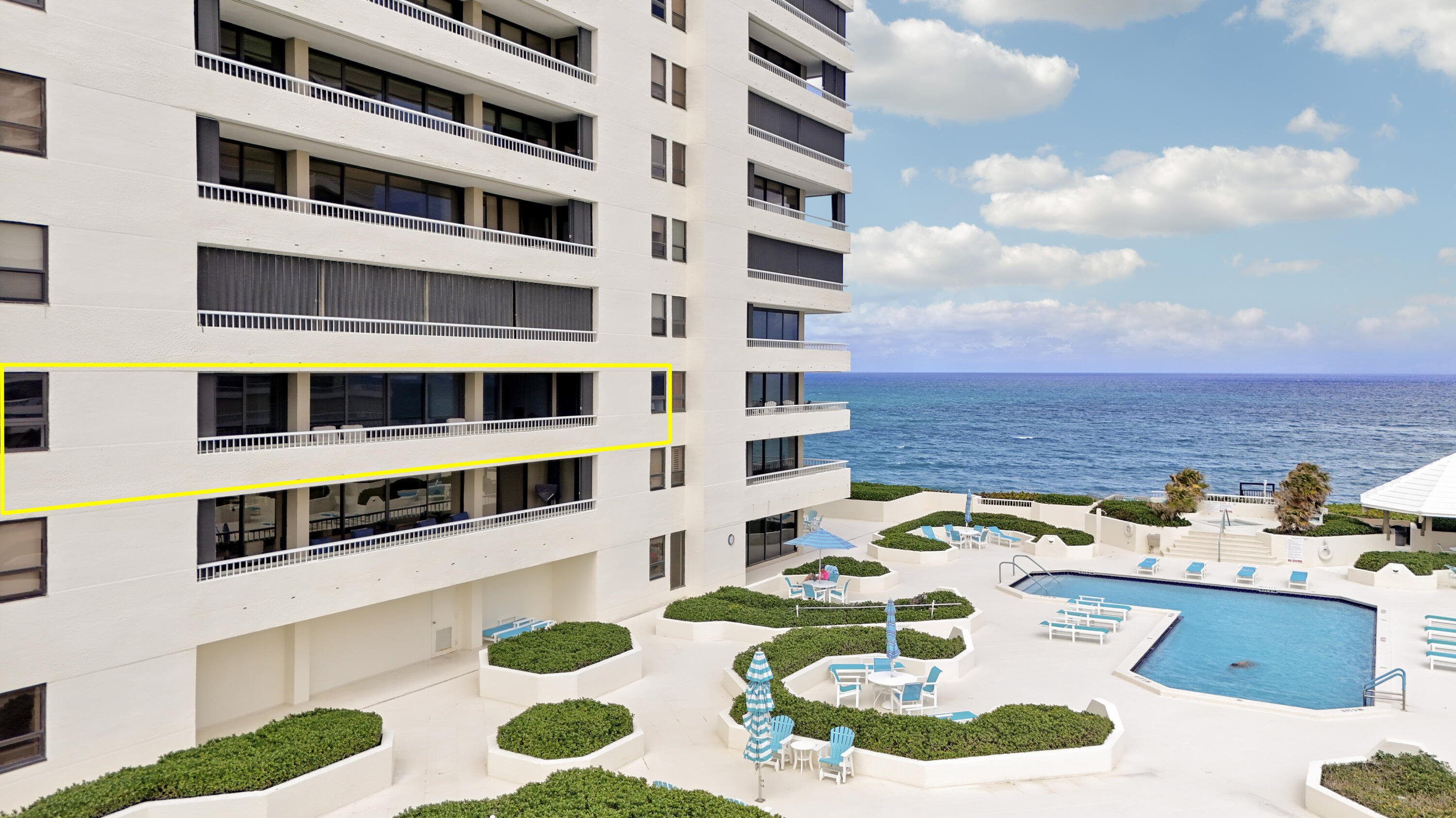 5280 North Ocean Drive, Unit 2F Riviera Beach, FL 33404 - Photo 29 of 35 a picture of a outdoor space with lounge chair