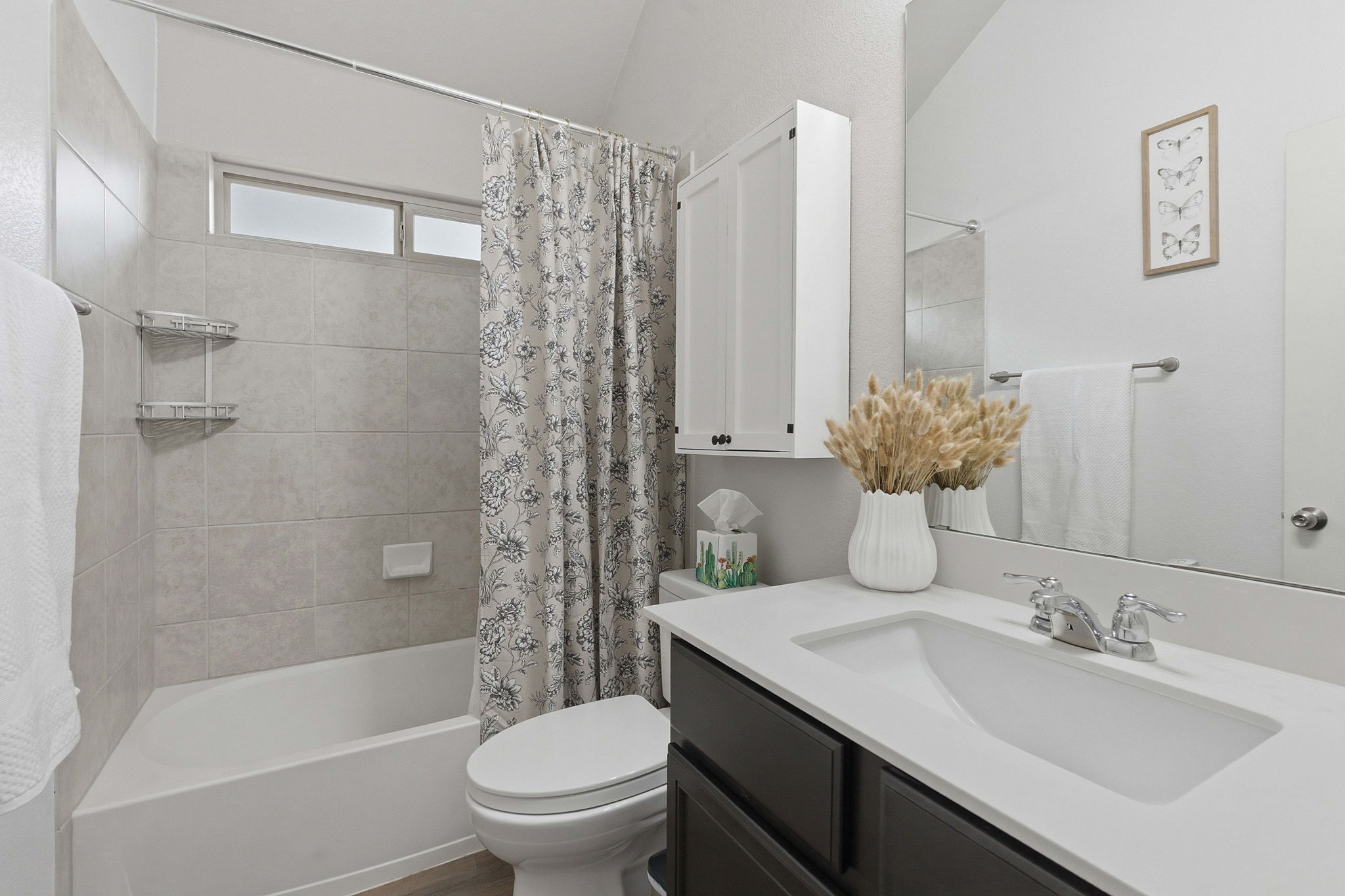 426 Tilly Lane Buda, TX 78610 - Photo 14 of 21 Bathroom with vanity and shower / bathtub combination with curtain