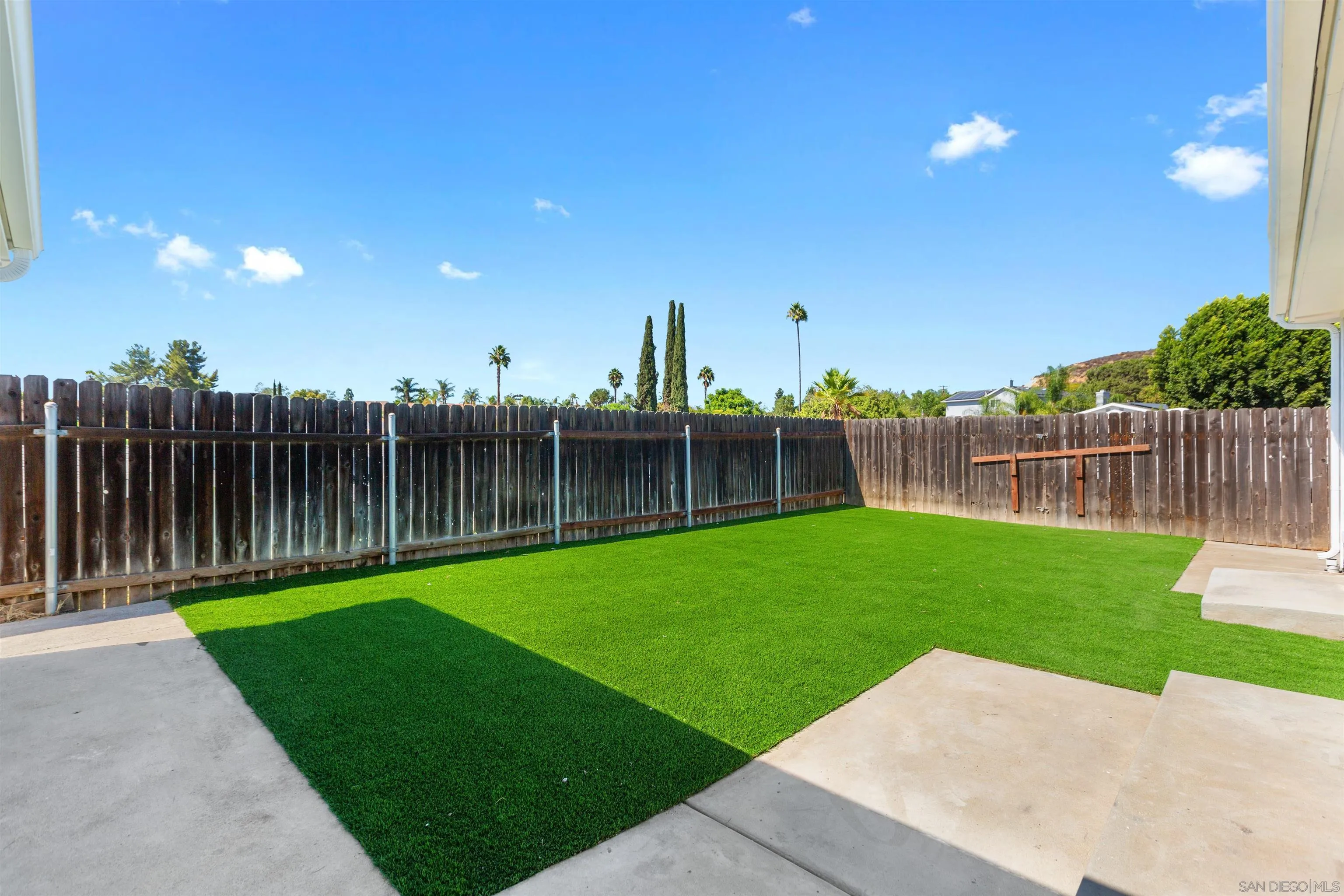 12694 Jackson Heights Drive El Cajon, CA 92021 - Photo 24 of 29 a view of a yard with a trampoline
