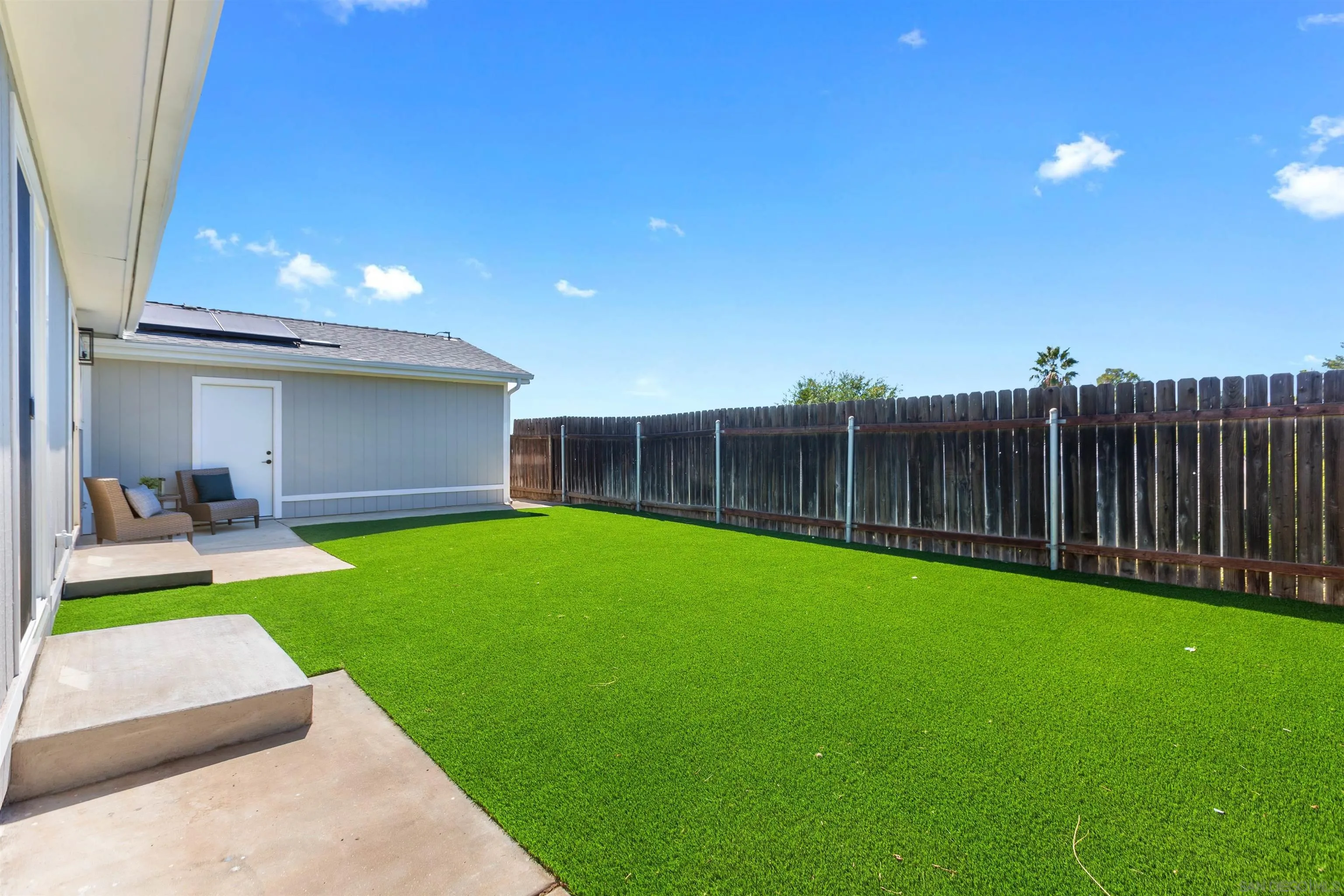 12694 Jackson Heights Drive El Cajon, CA 92021 - Photo 25 of 29 a view of a backyard with a garden and plants