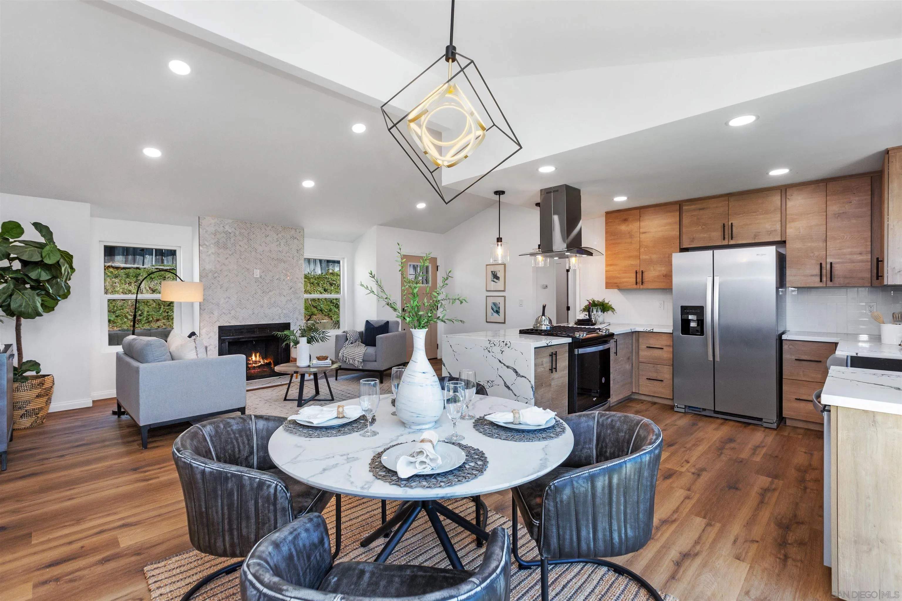 12694 Jackson Heights Drive El Cajon, CA 92021 - Photo 10 of 29 a view of a dining room with furniture window and wooden floor