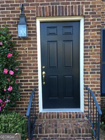 a view of door with wooden door