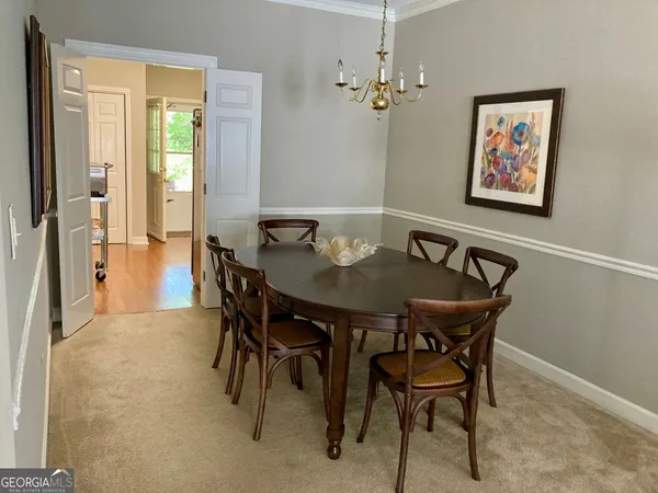 a view of a dining room with furniture