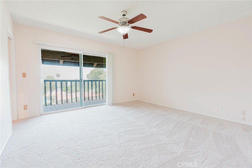 9576 Vía Bernardo Burbank, CA 91504 - Photo 14 of 38 an empty room with windows and ceiling fan