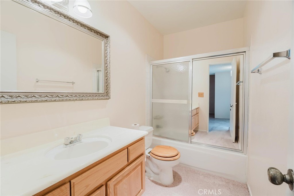 9576 Vía Bernardo Burbank, CA 91504 - Photo 24 of 38 a bathroom with a sink a toilet and shower