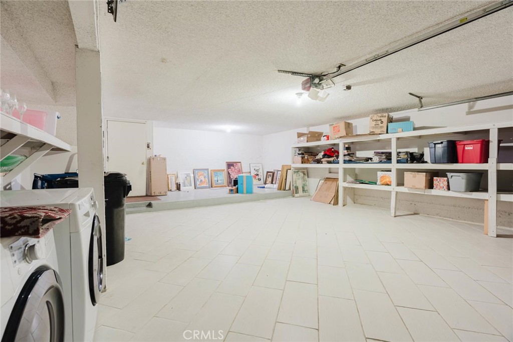 9576 Vía Bernardo Burbank, CA 91504 - Photo 26 of 38 a view of a storage & utility room with racks a window