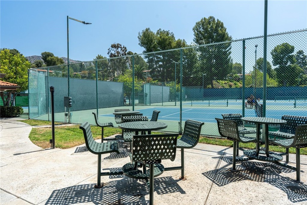 9576 Vía Bernardo Burbank, CA 91504 - Photo 34 of 38 a backyard of a house with a table and chairs