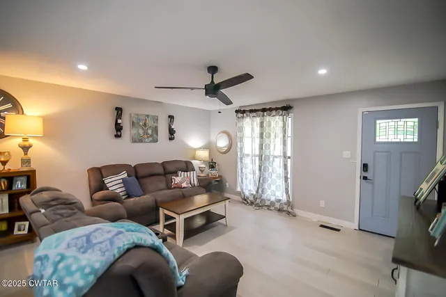 a bedroom with a bed and cabinets