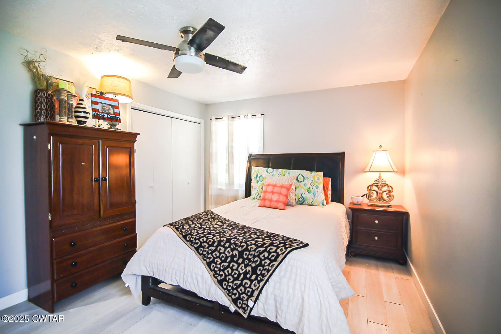 1374 Mifflin Road Jackson, TN 38301 - Photo 13 of 23 a bedroom with a bed and cabinets