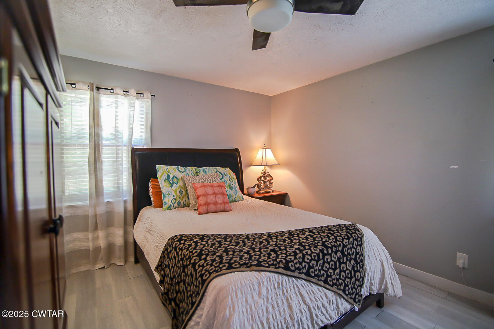 1374 Mifflin Road Jackson, TN 38301 - Photo 14 of 23 a bedroom with a bed and window