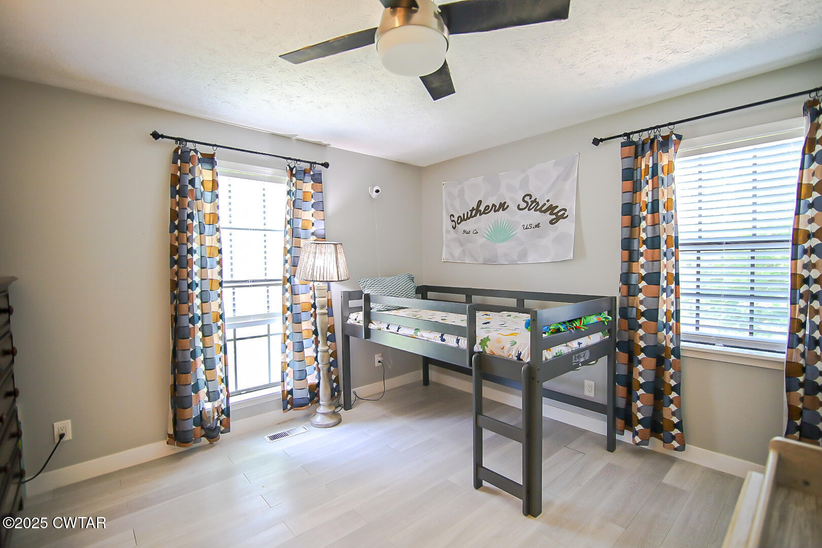 1374 Mifflin Road Jackson, TN 38301 - Photo 18 of 23 a view of a livingroom with workspace and a window