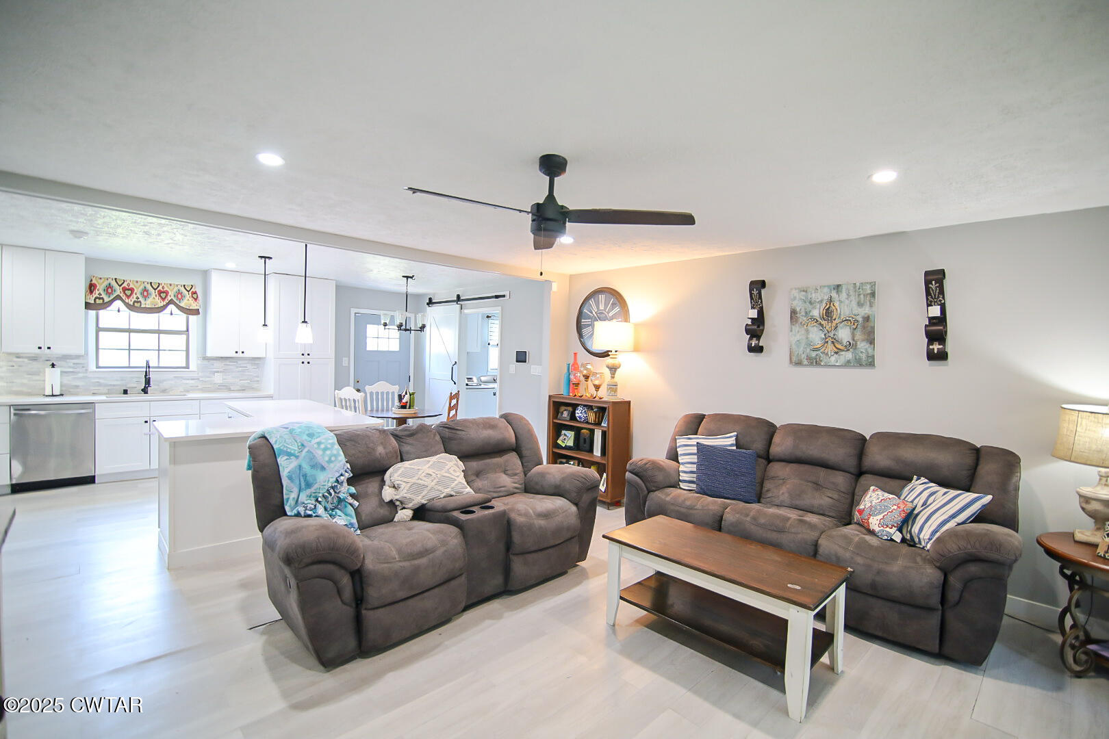 1374 Mifflin Road Jackson, TN 38301 - Photo 10 of 23 a living room with furniture and a large window