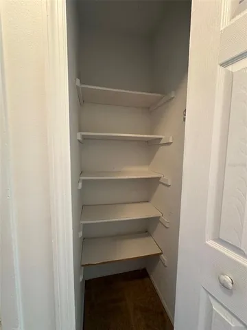 a view of hallway with a window