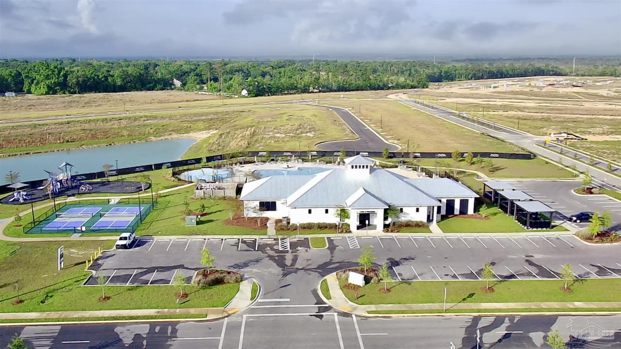 3312 Harrier Road Pace, FL 32571 - Photo 31 of 35 a view of an swimming pool with outdoor seating and yard in the back
