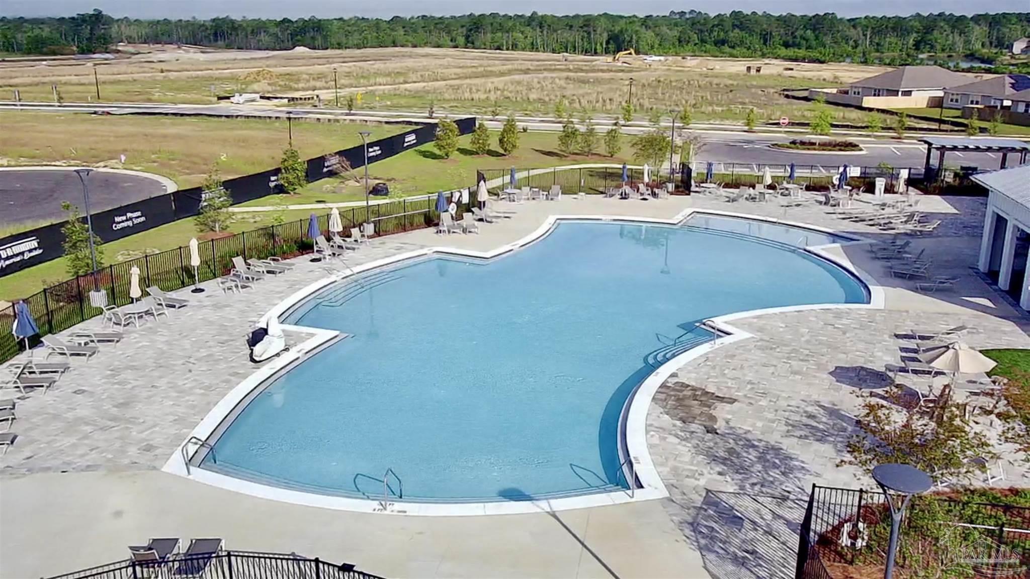 3312 Harrier Road Pace, FL 32571 - Photo 35 of 35 a view of a swimming pool with an ocean view