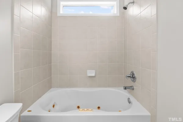 a bathroom with a bathtub