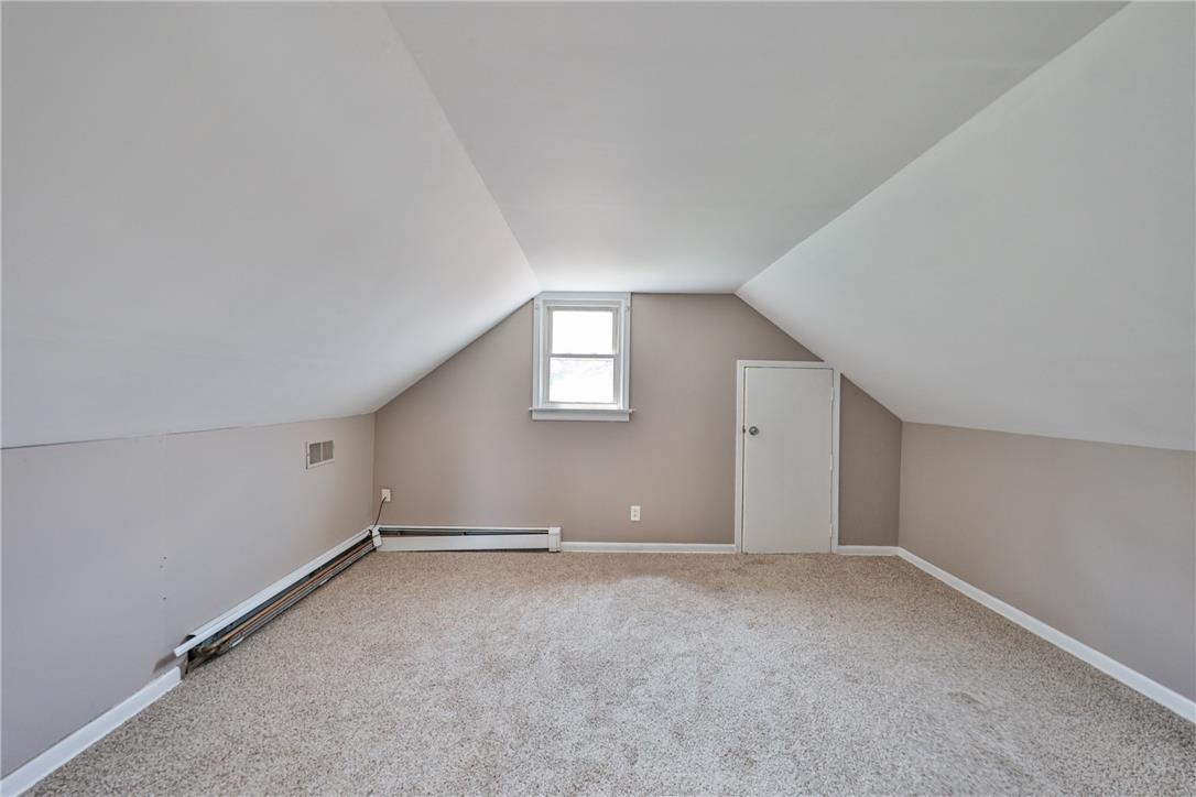 3050 Cornwall Road Bethlehem, PA 18017 - Photo 35 of 80 A windowed attic with sloped ceilings offers a cozy retreat or versatile bonus space.