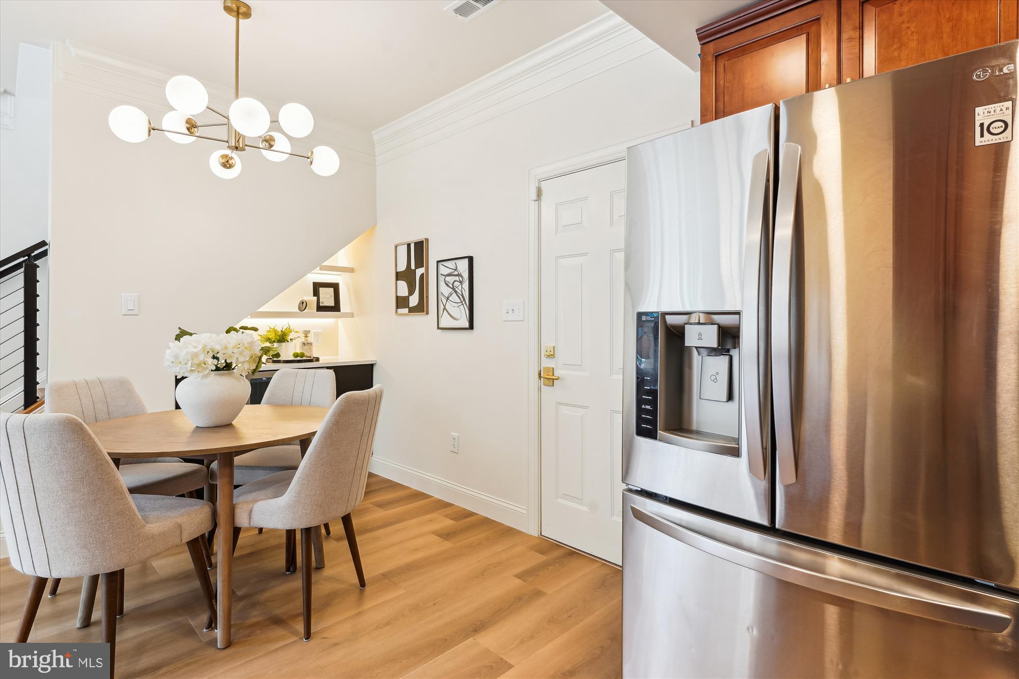 604 Highland Ridge Avenue, Unit 100 Gaithersburg, MD 20878 - Photo 14 of 46 a view of a dining room with furniture and wooden floor