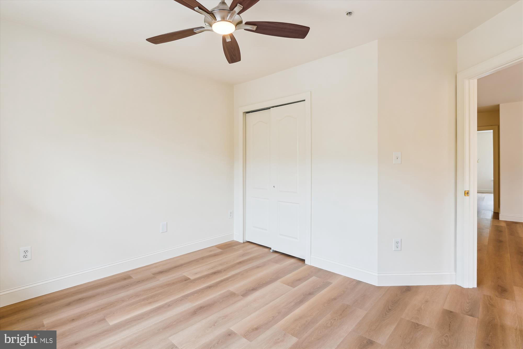 604 Highland Ridge Avenue, Unit 100 Gaithersburg, MD 20878 - Photo 24 of 46 a view of a room with a ceiling fan