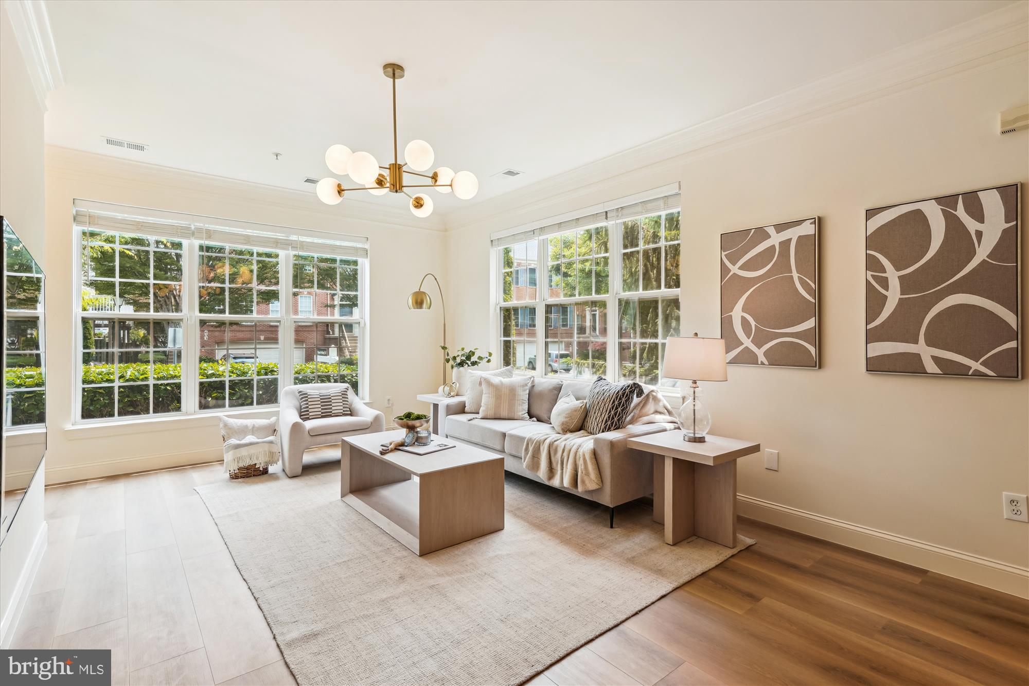 604 Highland Ridge Avenue, Unit 100 Gaithersburg, MD 20878 - Photo 3 of 46 a living room with furniture and large windows