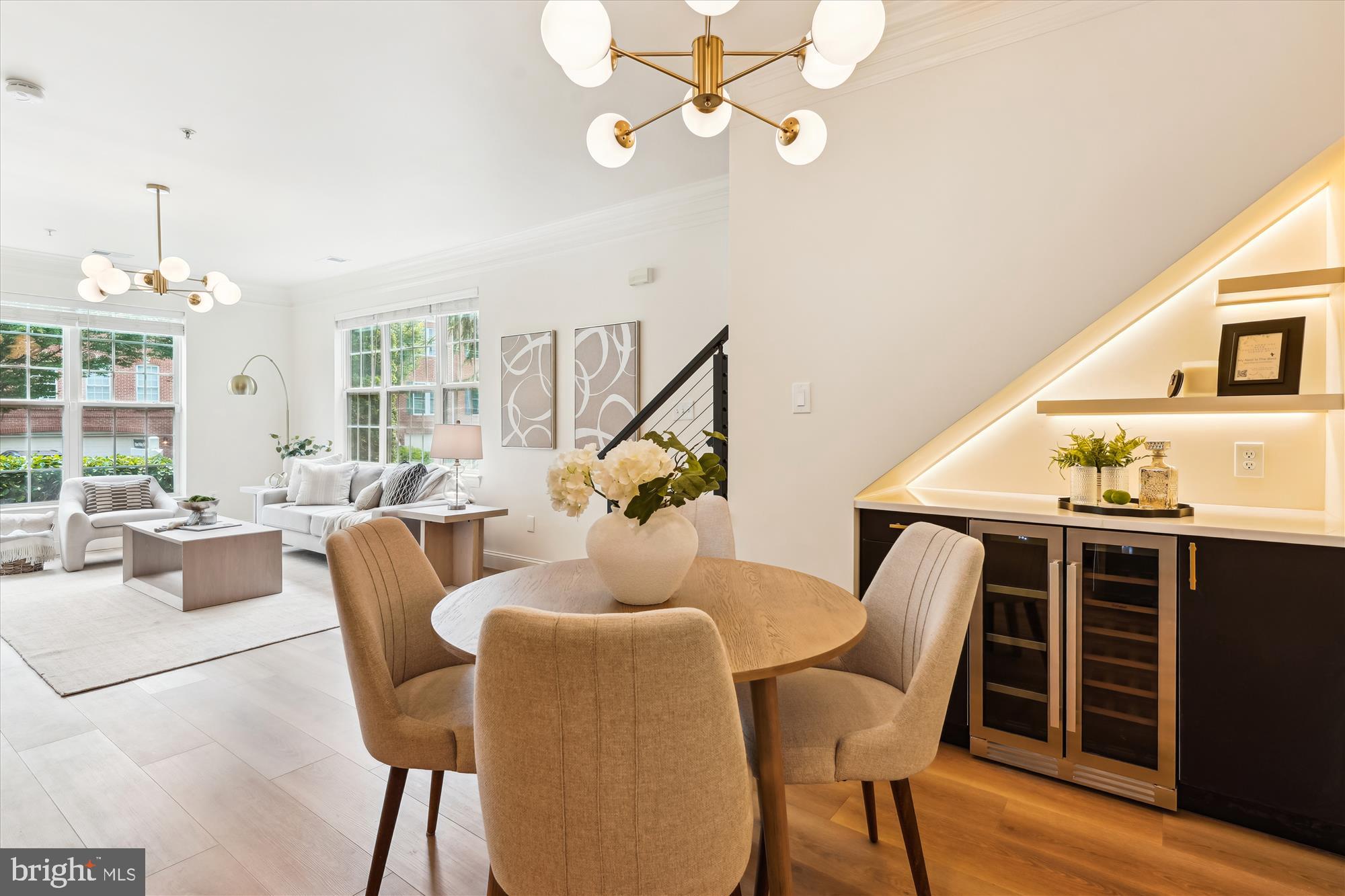 604 Highland Ridge Avenue, Unit 100 Gaithersburg, MD 20878 - Photo 6 of 46 a dining room with furniture a chandelier and wooden floor