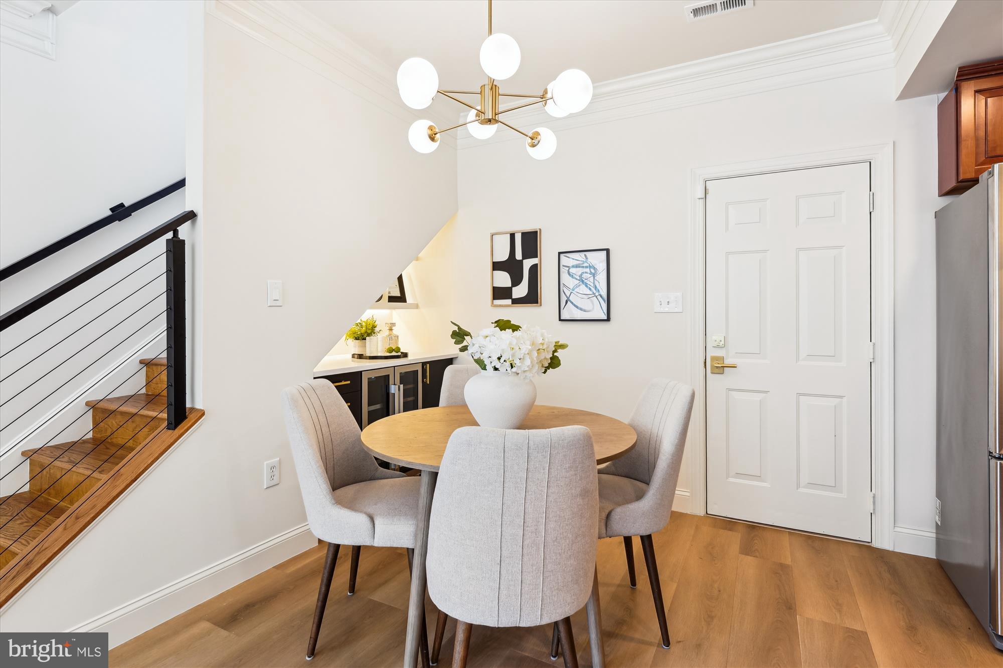 604 Highland Ridge Avenue, Unit 100 Gaithersburg, MD 20878 - Photo 8 of 46 a view of a dining room with furniture and wooden floor