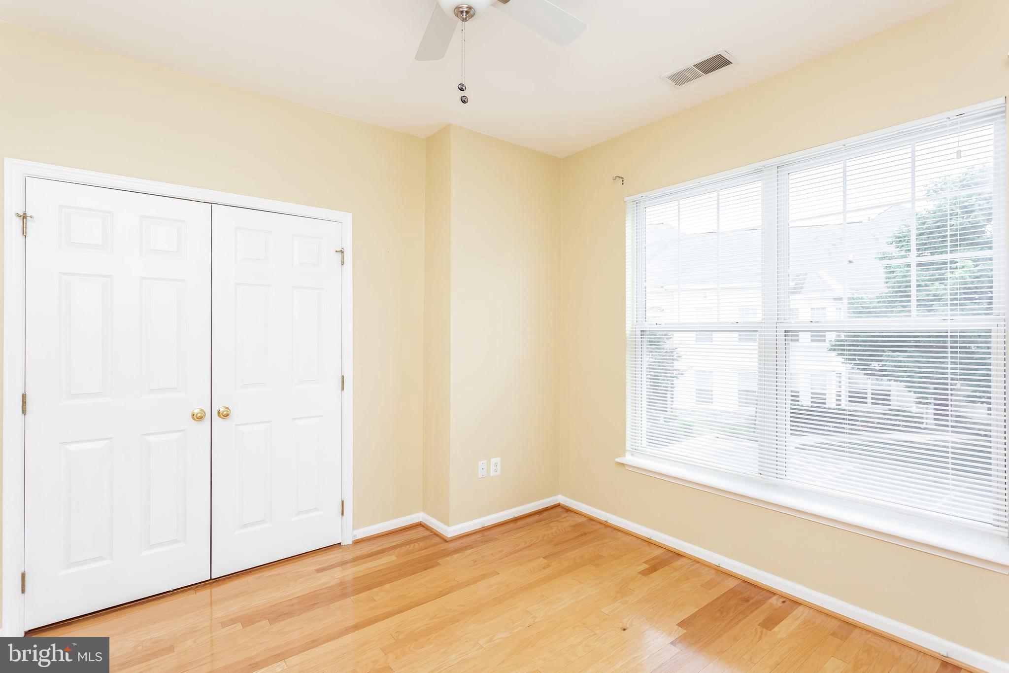52 Barbican Way, Unit 52 Baltimore, MD 21208 - Photo 25 of 29 a view of an empty room with a window