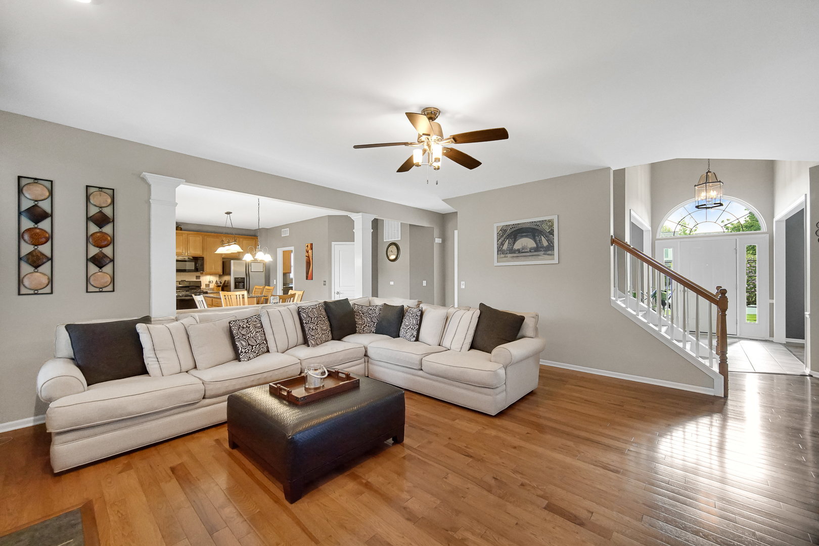 149 Lilac Street Bolingbrook, IL 60490 - Photo 3 of 3 a living room with furniture and a chandelier