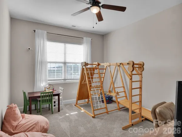 a view of hallway with windows