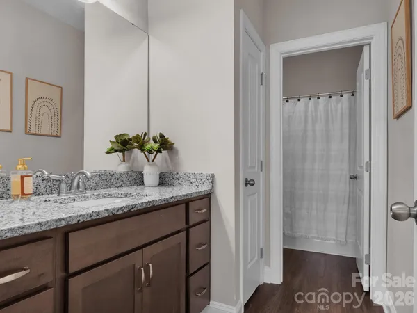 a view of storage and utility room with washer and dryer