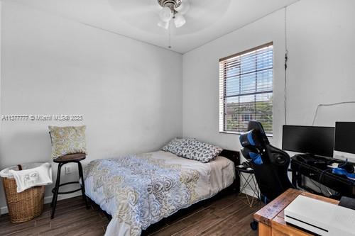 3772 Southeast 2nd Drive, Unit 3772 Homestead, FL 33033 - Photo 12 of 36 a bedroom with a bed and a window