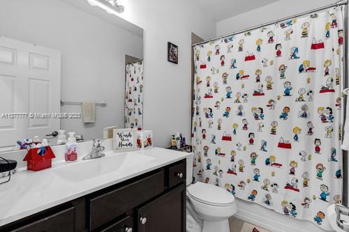 3772 Southeast 2nd Drive, Unit 3772 Homestead, FL 33033 - Photo 14 of 36 a bathroom with a sink toilet and a shower
