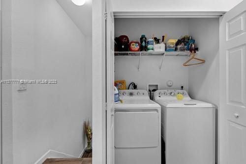 3772 Southeast 2nd Drive, Unit 3772 Homestead, FL 33033 - Photo 17 of 36 a view of storage room with washer and dryer