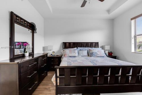 3772 Southeast 2nd Drive, Unit 3772 Homestead, FL 33033 - Photo 20 of 36 a bedroom with a bed and a dresser