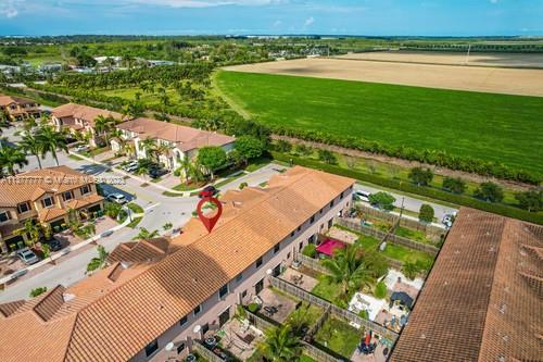 3772 Southeast 2nd Drive, Unit 3772 Homestead, FL 33033 - Photo 33 of 36 an aerial view of residential houses with outdoor space