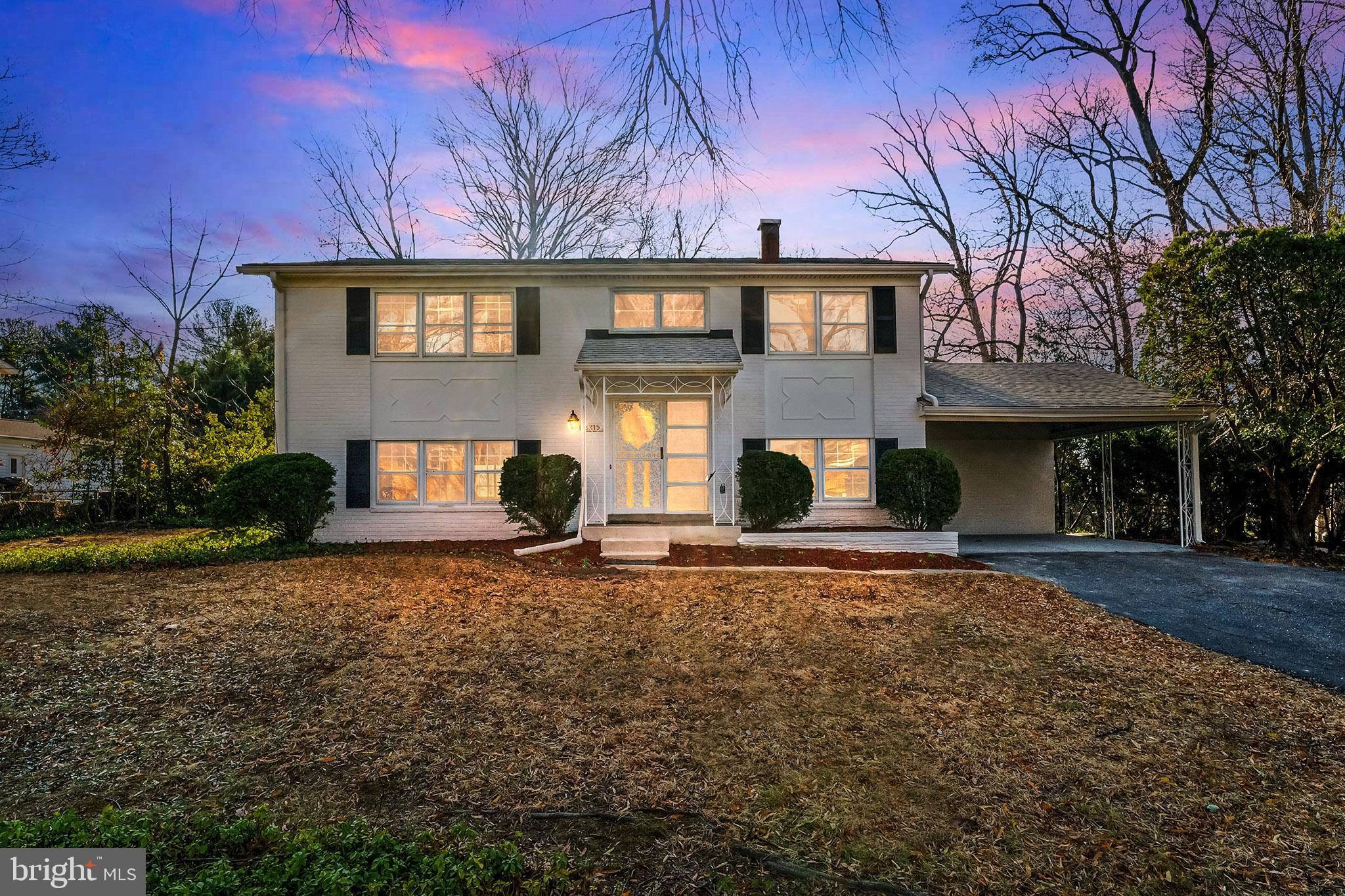 front view of a house with a yard