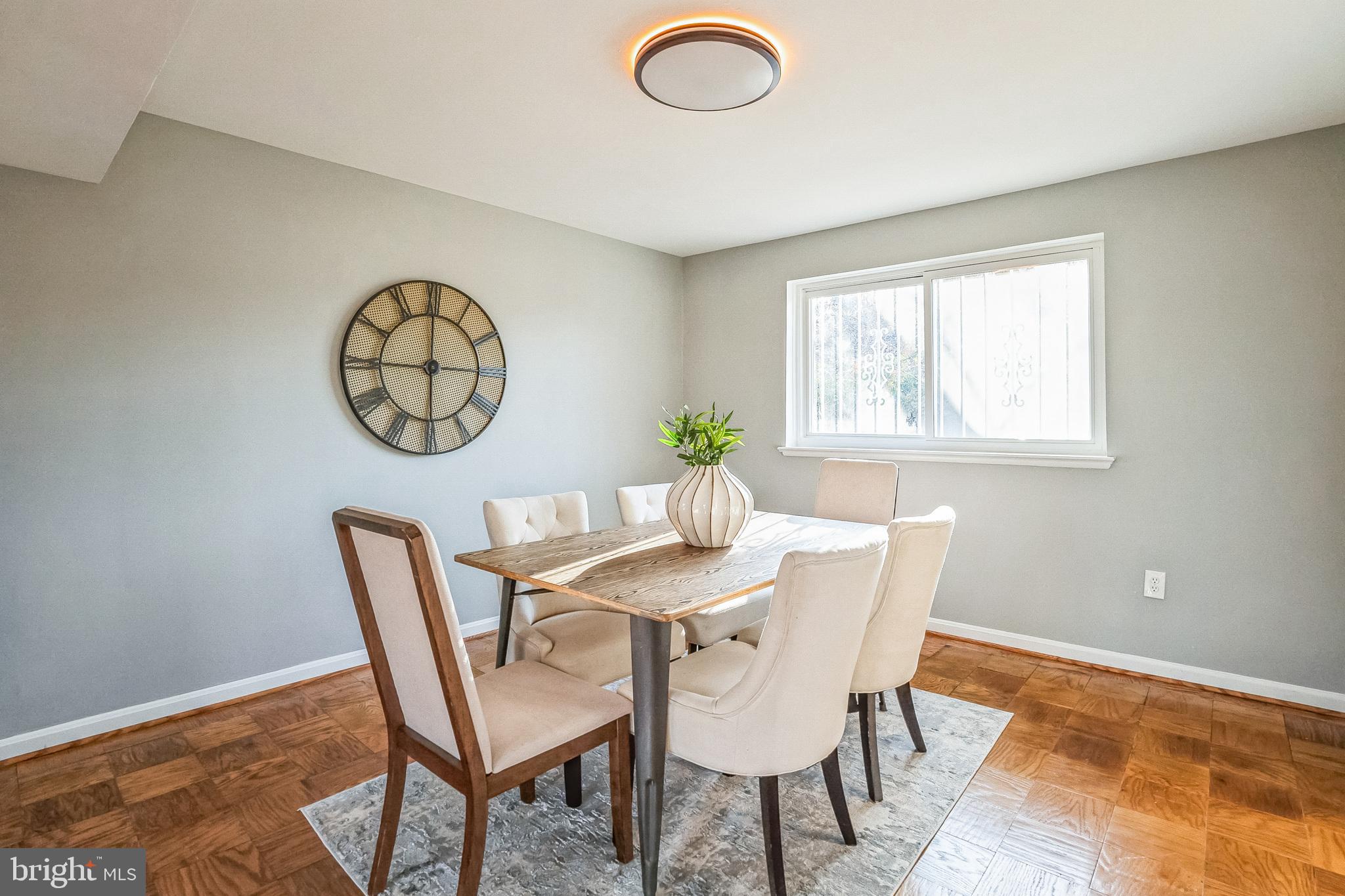2215 Solmar Drive Silver Spring, MD 20904 - Photo 13 of 34 a view of a dining room with furniture window and wooden floor