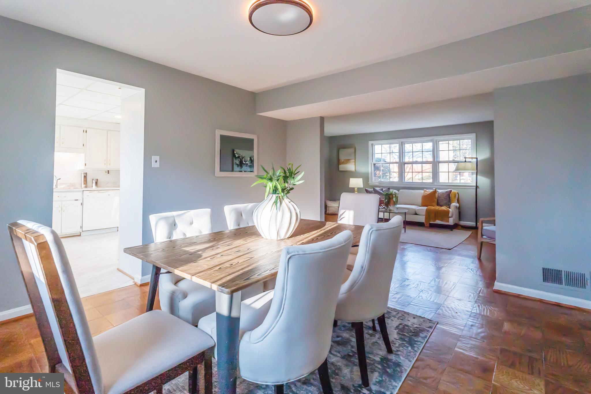 2215 Solmar Drive Silver Spring, MD 20904 - Photo 14 of 34 a view of a dining room with furniture and a potted plant