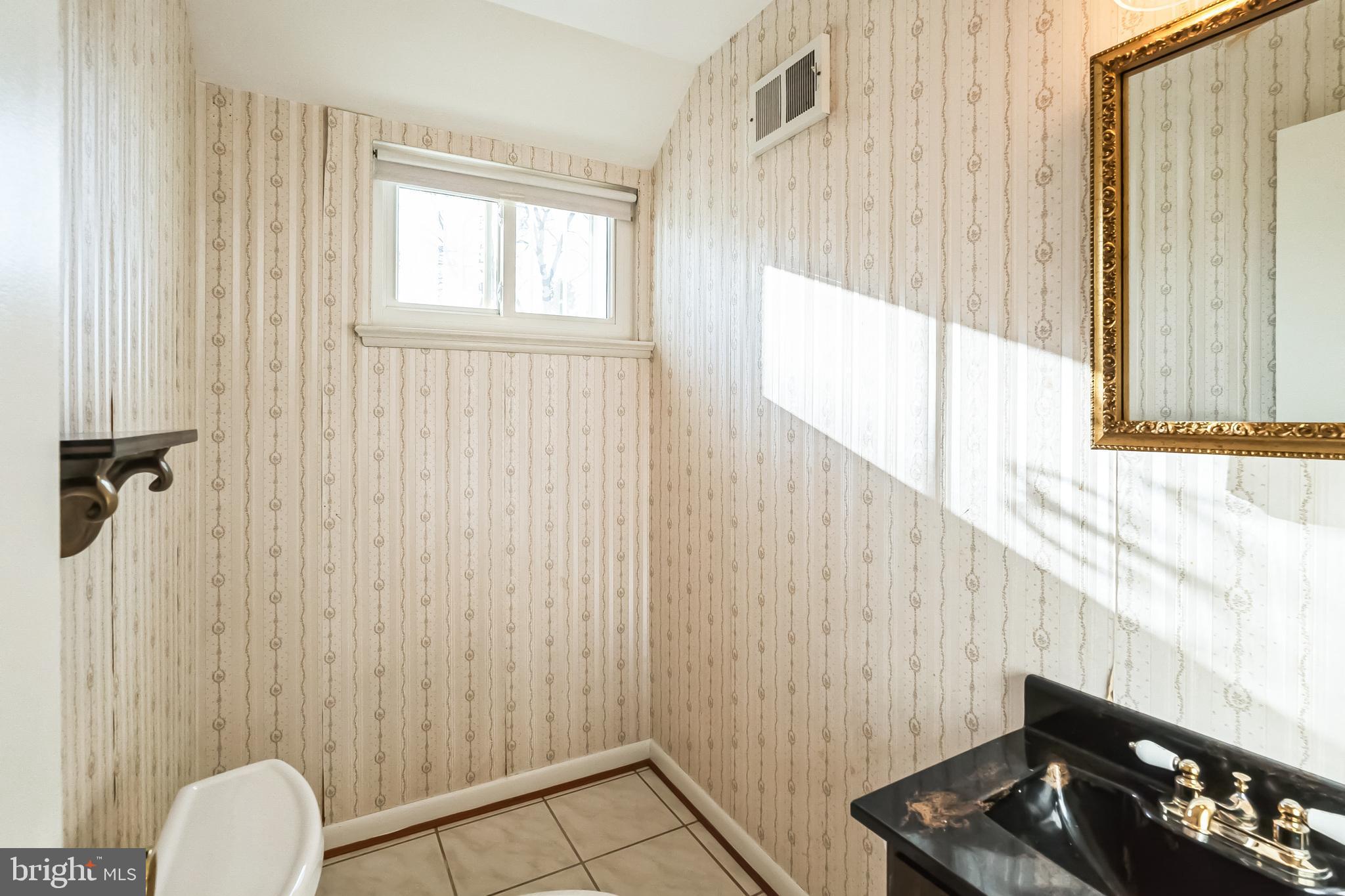 2215 Solmar Drive Silver Spring, MD 20904 - Photo 19 of 34 a view of a bathroom with a window