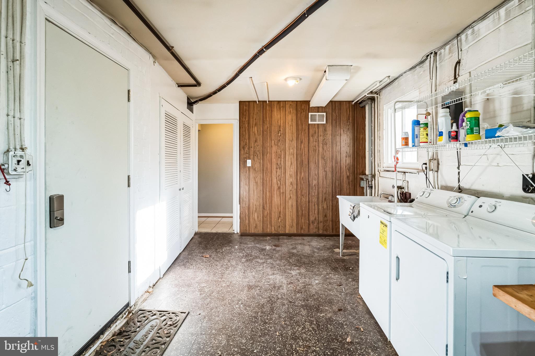 2215 Solmar Drive Silver Spring, MD 20904 - Photo 20 of 34 a view of a hallway with washer and dryer