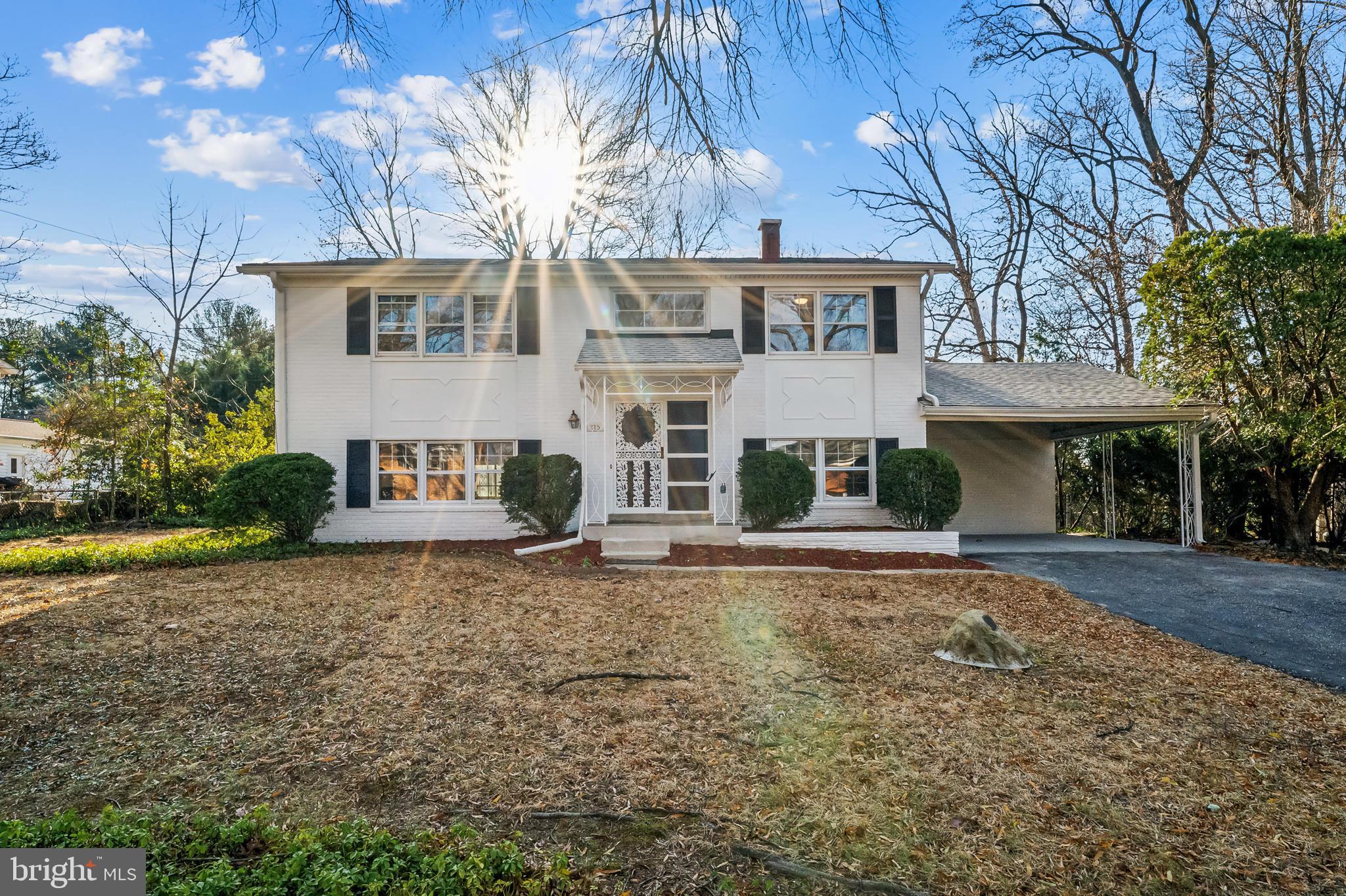 2215 Solmar Drive Silver Spring, MD 20904 - Photo 2 of 34 a view of a white house with a yard and large tree