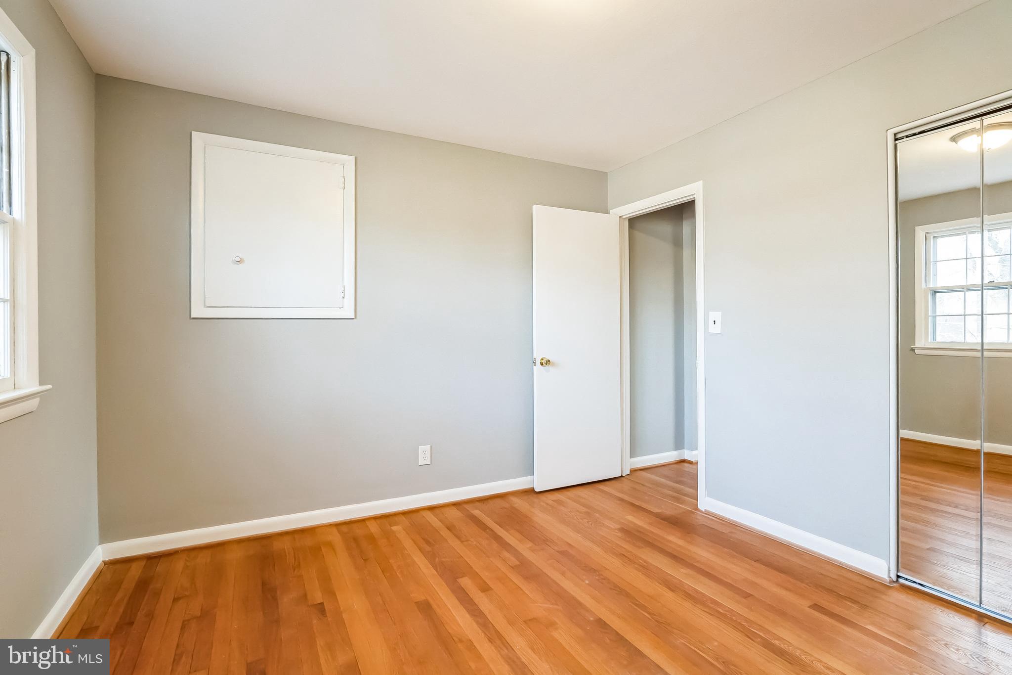 2215 Solmar Drive Silver Spring, MD 20904 - Photo 29 of 34 a view of an empty room with wooden floor