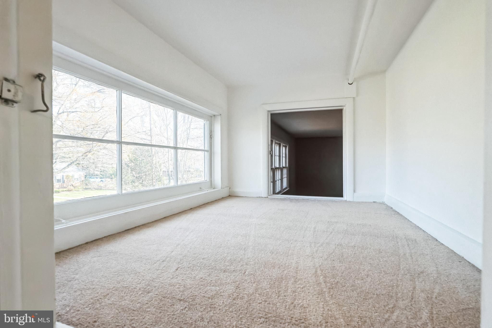 2215 Solmar Drive Silver Spring, MD 20904 - Photo 30 of 34 an empty room with windows and closet