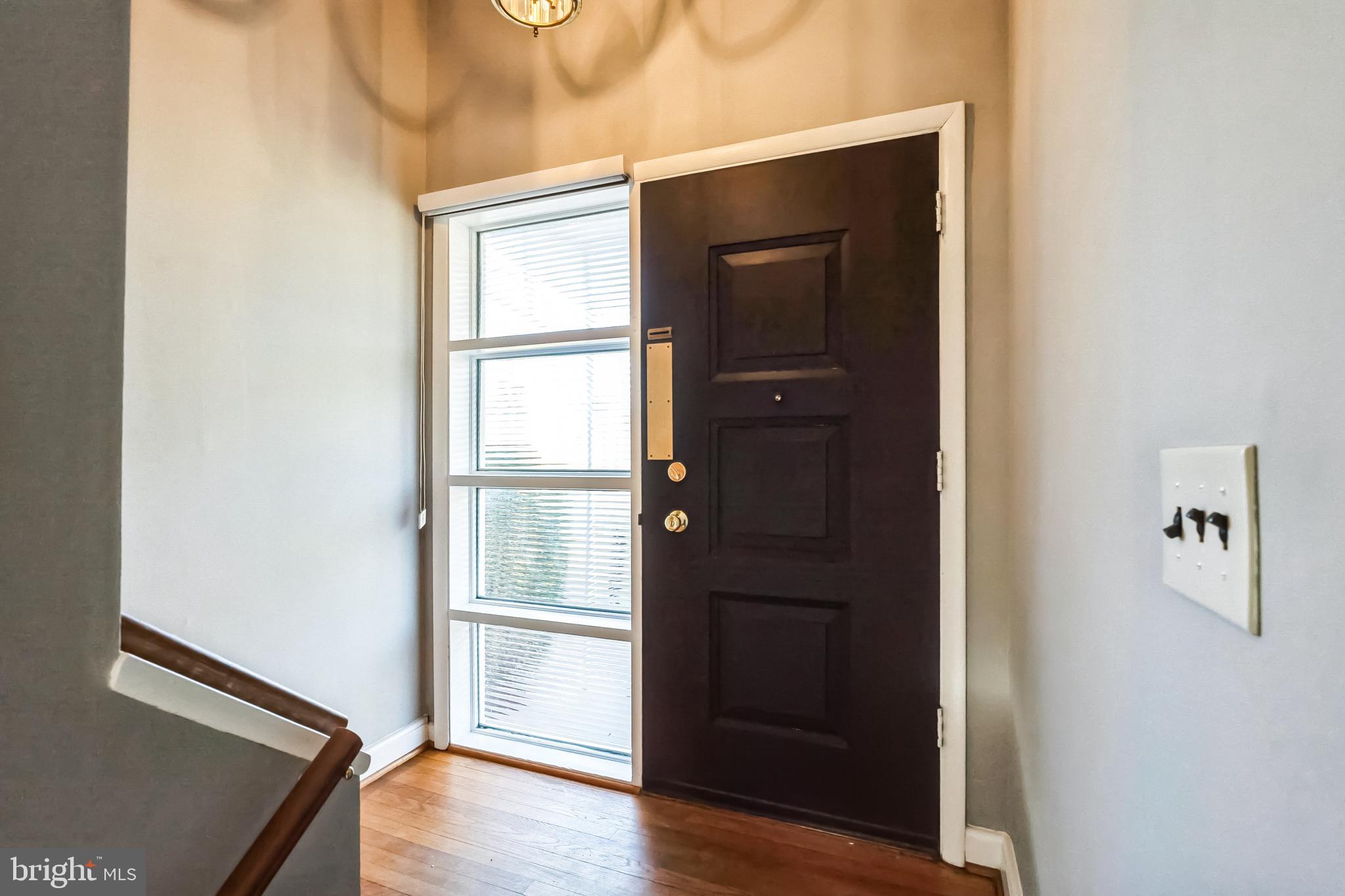 2215 Solmar Drive Silver Spring, MD 20904 - Photo 4 of 34 a view of an entryway with wooden floor