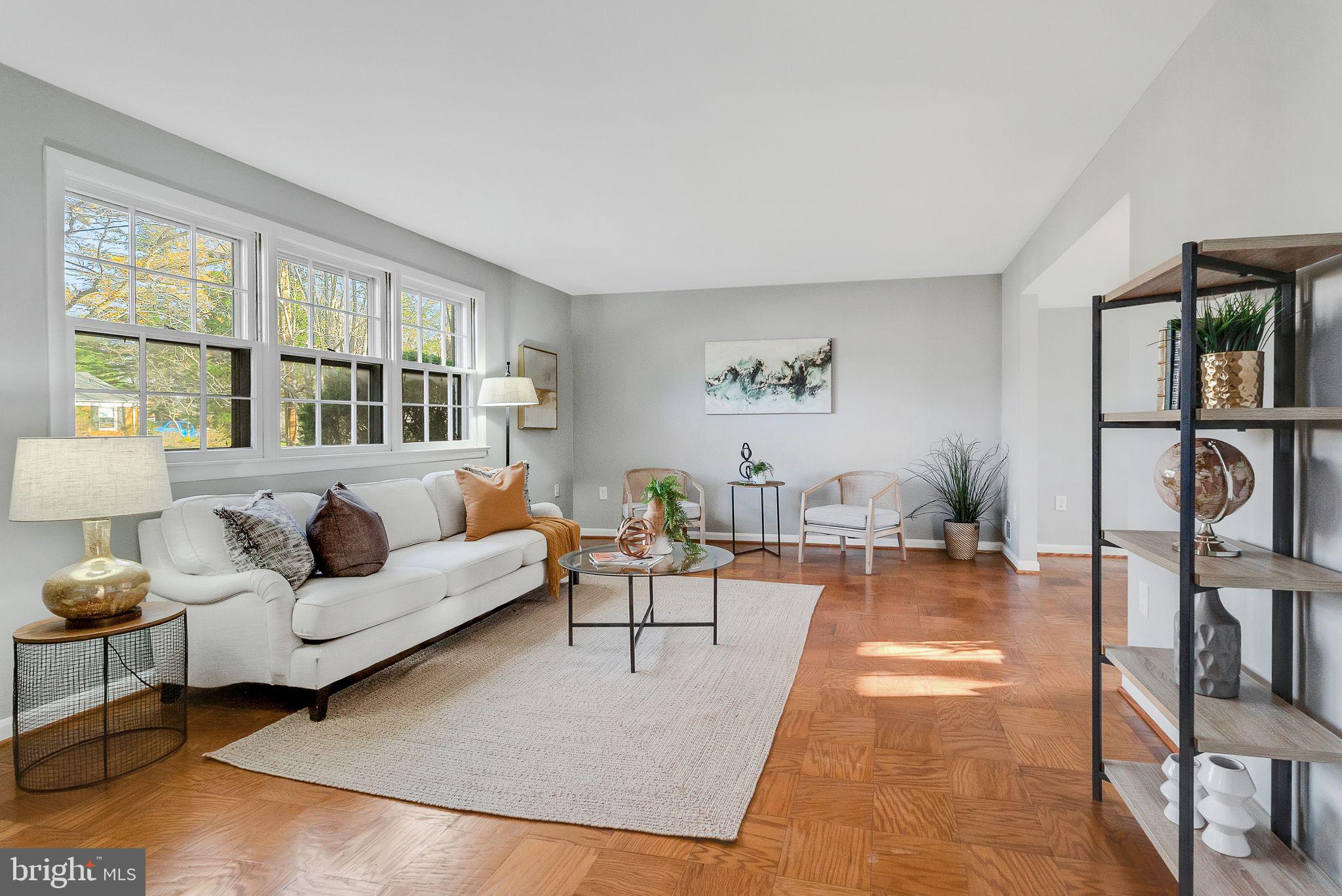 2215 Solmar Drive Silver Spring, MD 20904 - Photo 6 of 34 a living room with furniture large window and wooden floor