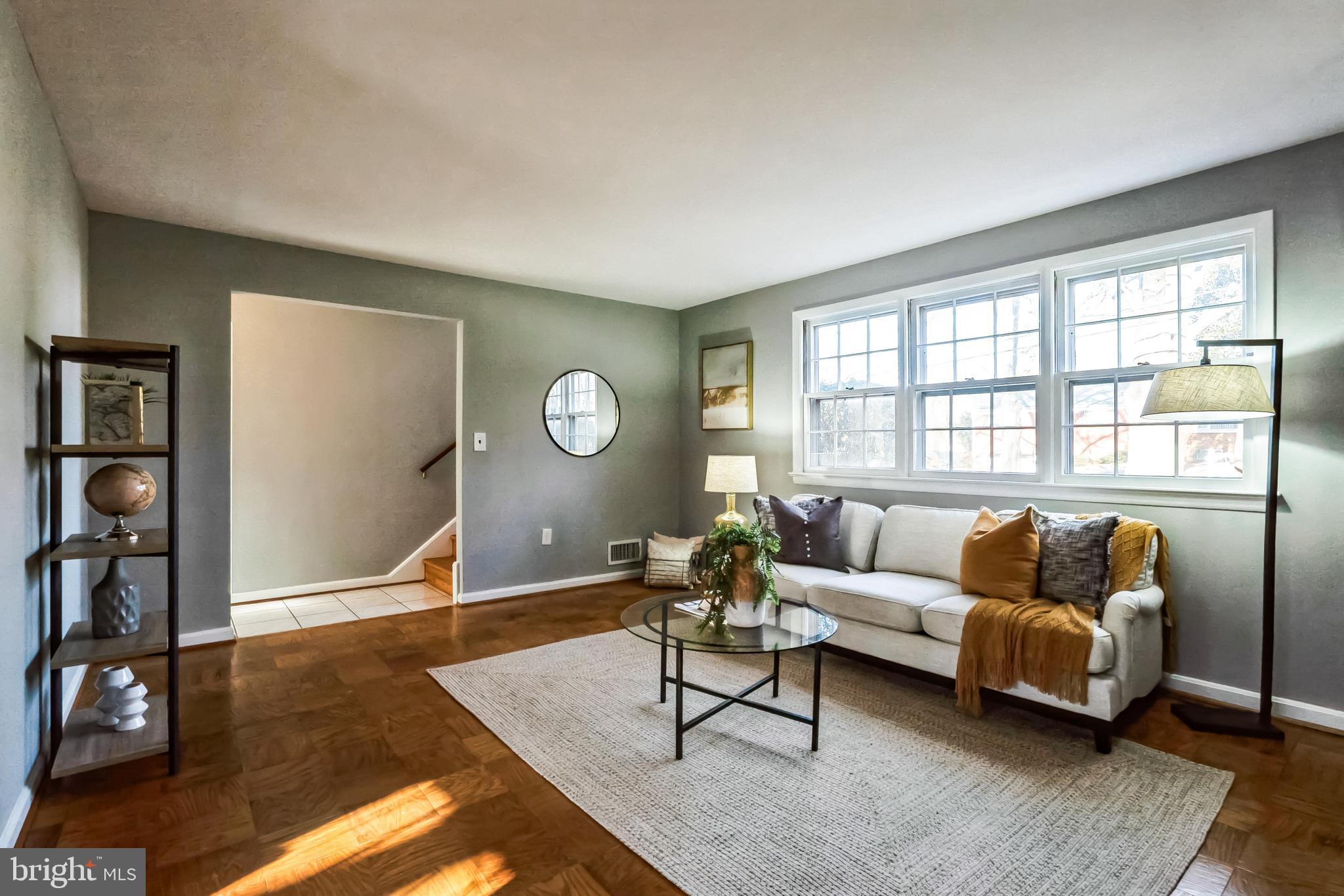 2215 Solmar Drive Silver Spring, MD 20904 - Photo 8 of 34 a living room with furniture and a large window