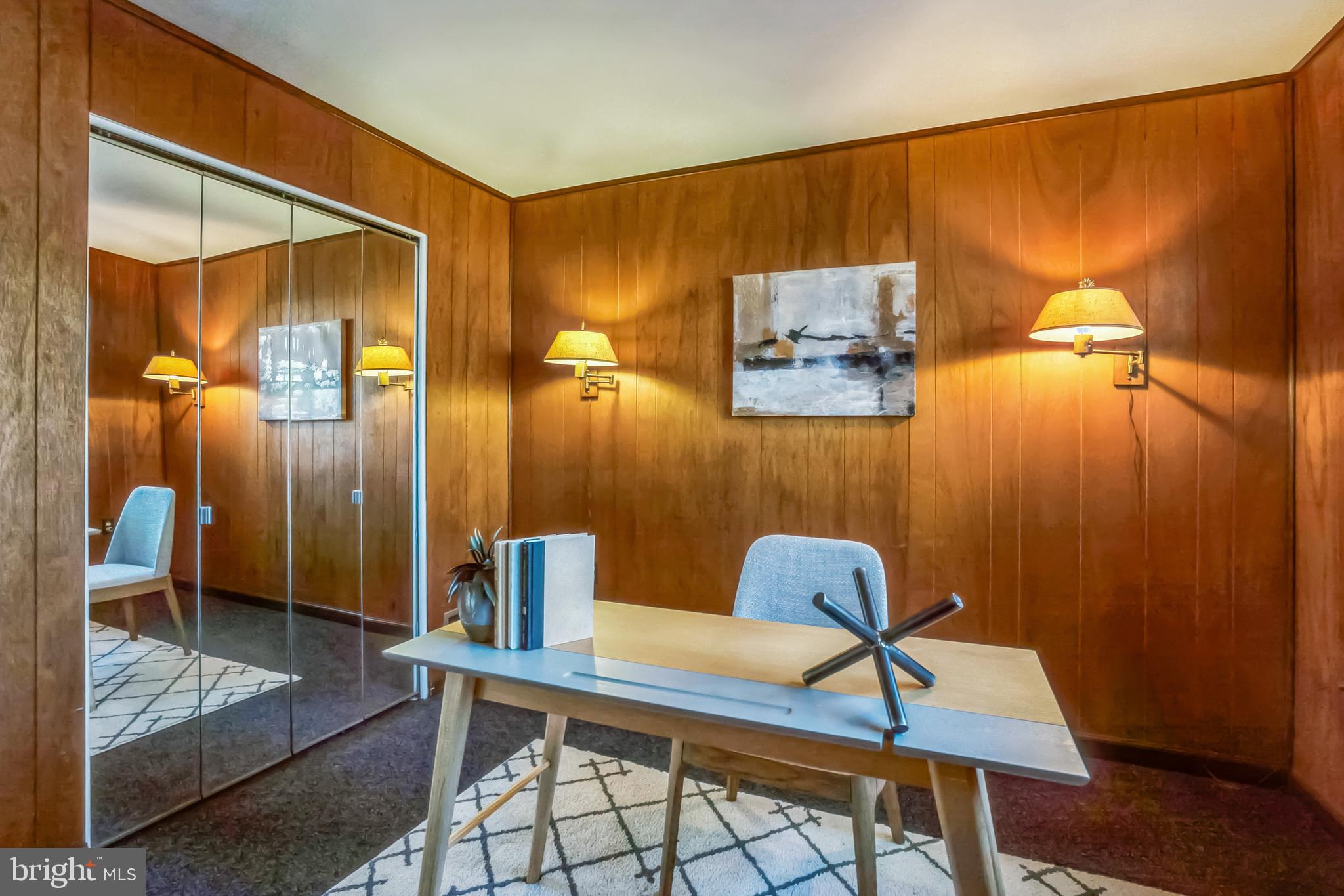 2215 Solmar Drive Silver Spring, MD 20904 - Photo 10 of 34 a workspace with furniture and wooden floor