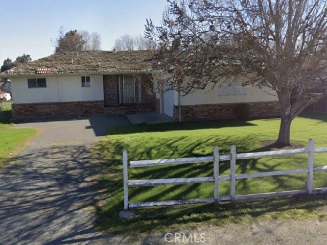 1910 Eden Plains Road Brentwood, CA 94513 - Photo 1 of 1 a view of a house with a yard and a large tree