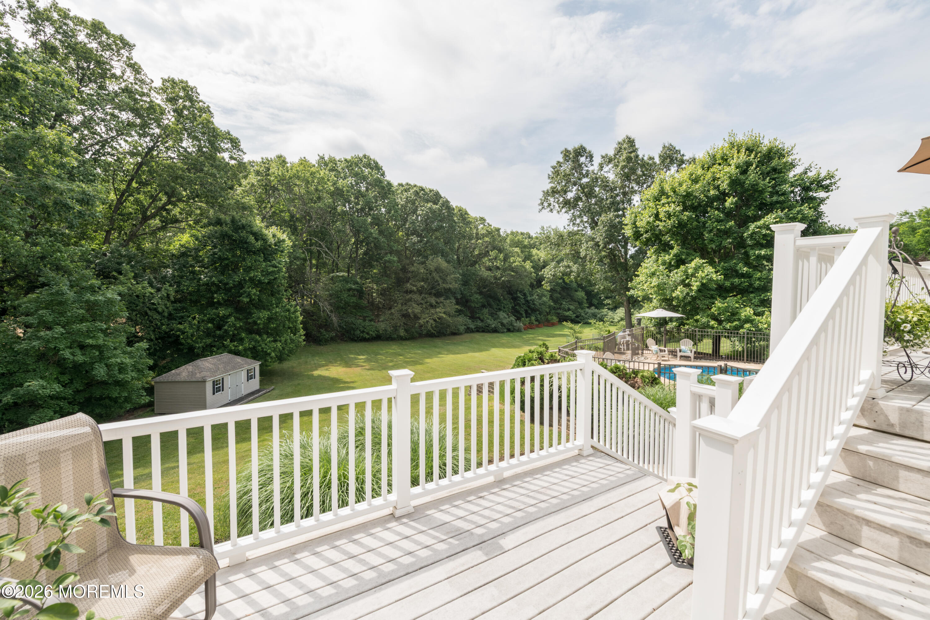 9 Rues Road Cream Ridge, NJ 08514 - Photo 49 of 56 a view of a wooden deck and a yard with swimming pool