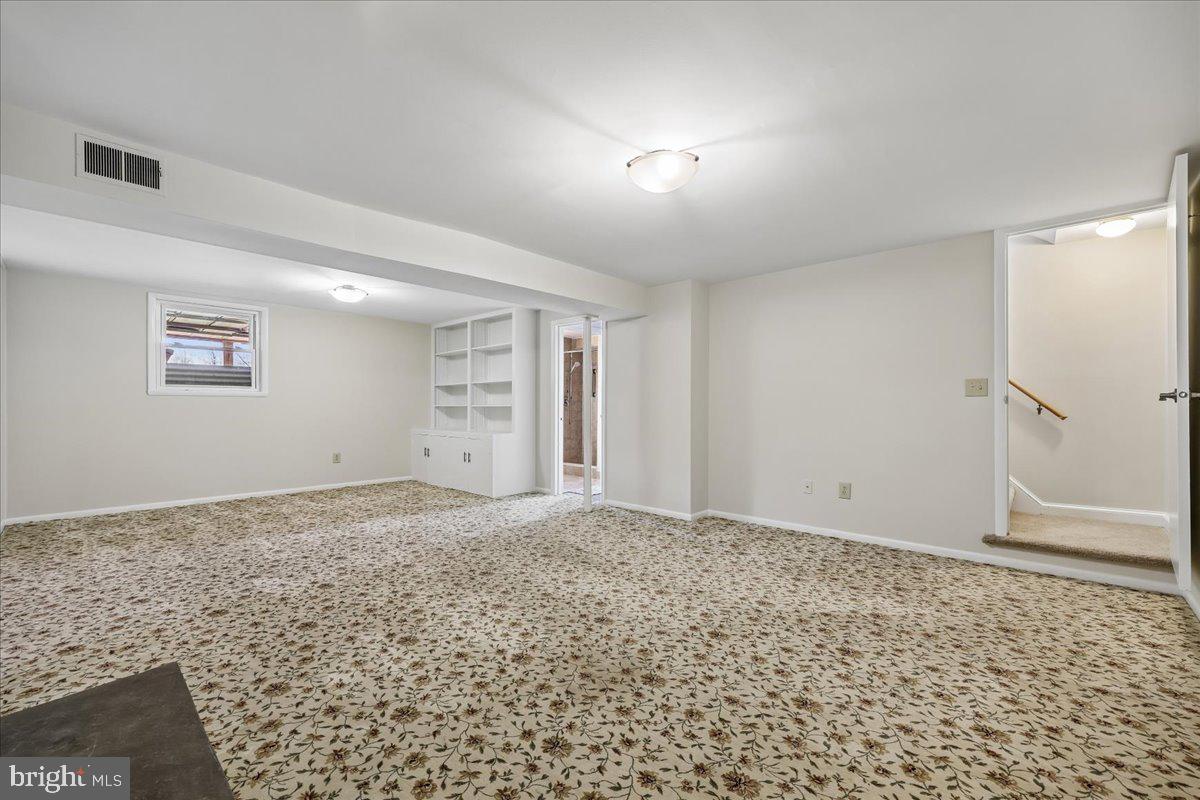 11924 Fernshire Road Gaithersburg, MD 20878 - Photo 20 of 74 Spacious, versatile lower-level retreat.